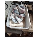 Tote with assorted painting tarps