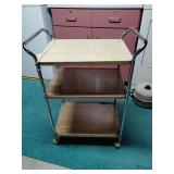 Metal rolling cart with outlet
