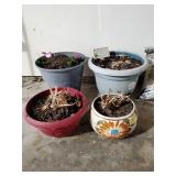 (4) Flower planters one is ceramic