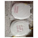 Two - New white toilet seats