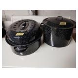 Two enamel pots with lids, with canning supplies