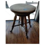 Vintage wood stool with cast iron feet with glass