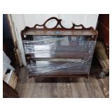 Ornate hanging shelf with mirror back, has some