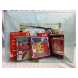 Assorted Books in Plastic Tote