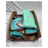 Assorted Kitchen Towels, Oven Mitts, and Hot Pads