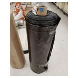Roll of thick black plastic sheeting
