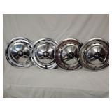 4 Vintage 1957 Chevrolet Bel Air hubcaps,