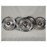 Set of 5 15-inch Oldsmobile hubcaps,