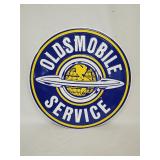 Pressed tin Oldsmobile service sign
