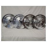Set of 4 1956 Oldsmobile hubcaps