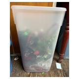 Assorted Holiday Items in Wrapping Paper Container