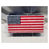 Needle Point Flag Themed Covered Brick