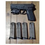 Sig Sauer SP2022 9mm with under mount stream light