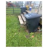 2- Toter Trash Cans with Lids