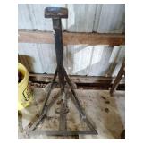 Foot pedal clamp on tripod