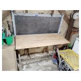 Work bench with peg organizer back