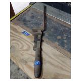 Vintage pipe wrench made for twisting Damascus