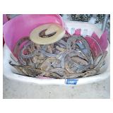 Horseshoe assortment in laundry basket