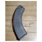 One extended promag 7.62 x 39mm partially loaded