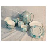 Tea Pot 7'  Tea Cups 2.25'  Saucers 6'