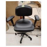 Stationary office chair adjustable height,arms,and