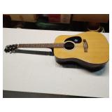Rogue acoustic guitar