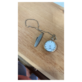 Vintage pocket watch with knife