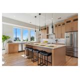 Gourmet kitchen with oversized island & custom finishes