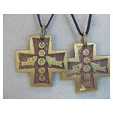 Two Matching Metal Crosses On Cord Necklaces