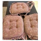 Three Outside Seat Cushions With Some Fading