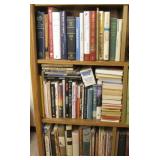 Three Left Shelves Of Books On 1st Bookcase