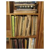 Three Right Shelves Of Books On 1st Bookcase