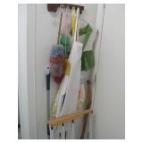 Brooms, Mops, Wall Hooks Shown In Laundry Room