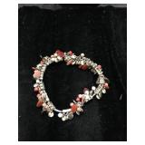 Beaded Bracelet with Red and Orange Accents on Ela