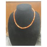 Necklace with Orange Beaded Design