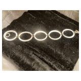 Silver-Tone Bracelet With Circular Link Design