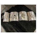 Silver Aztec-Themed Cuff Bracelet with Embossed Pa