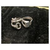 Two Silver-Toned Ring Accessories