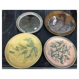 Four Ann Brink Pottery Plates with Various Designs