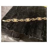 Gold-Tone Link Bracelet with Floral Accents
