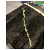 Gold Toned Chain Bracelet with Green Stone Accents