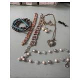 4 bracelets, necklace, and 3 pairs Earrings