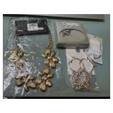 2 necklaces and 2 sets of earrings