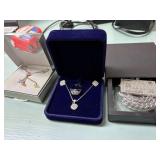 3 Necklaces, Ring, and earring set