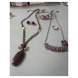 2 Necklaces, Ring, and a pair of earrings