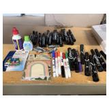 23 black permanent markers, 6 dry erase
