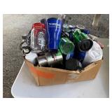 box of water bottles no lids, metal mug, tumblers