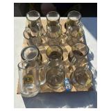 12 lions club glass mugs,