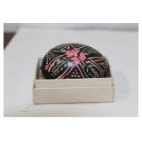 A Hand Painted Wooden Egg