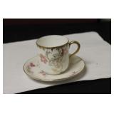 A Limoge Dematesse Cup And Saucer